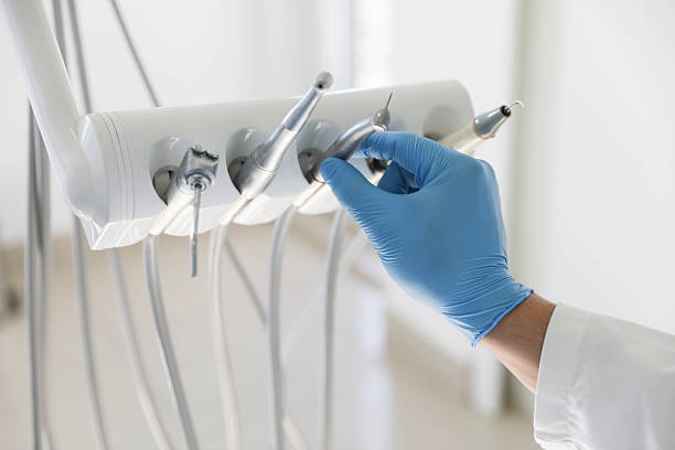 Professional Emergency Dentist technician working in Bay Park, NY